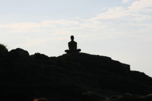 Meditating outdoors