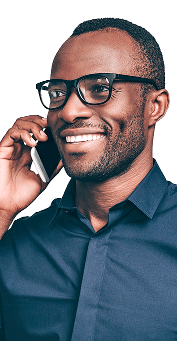 man in glasses holding phone